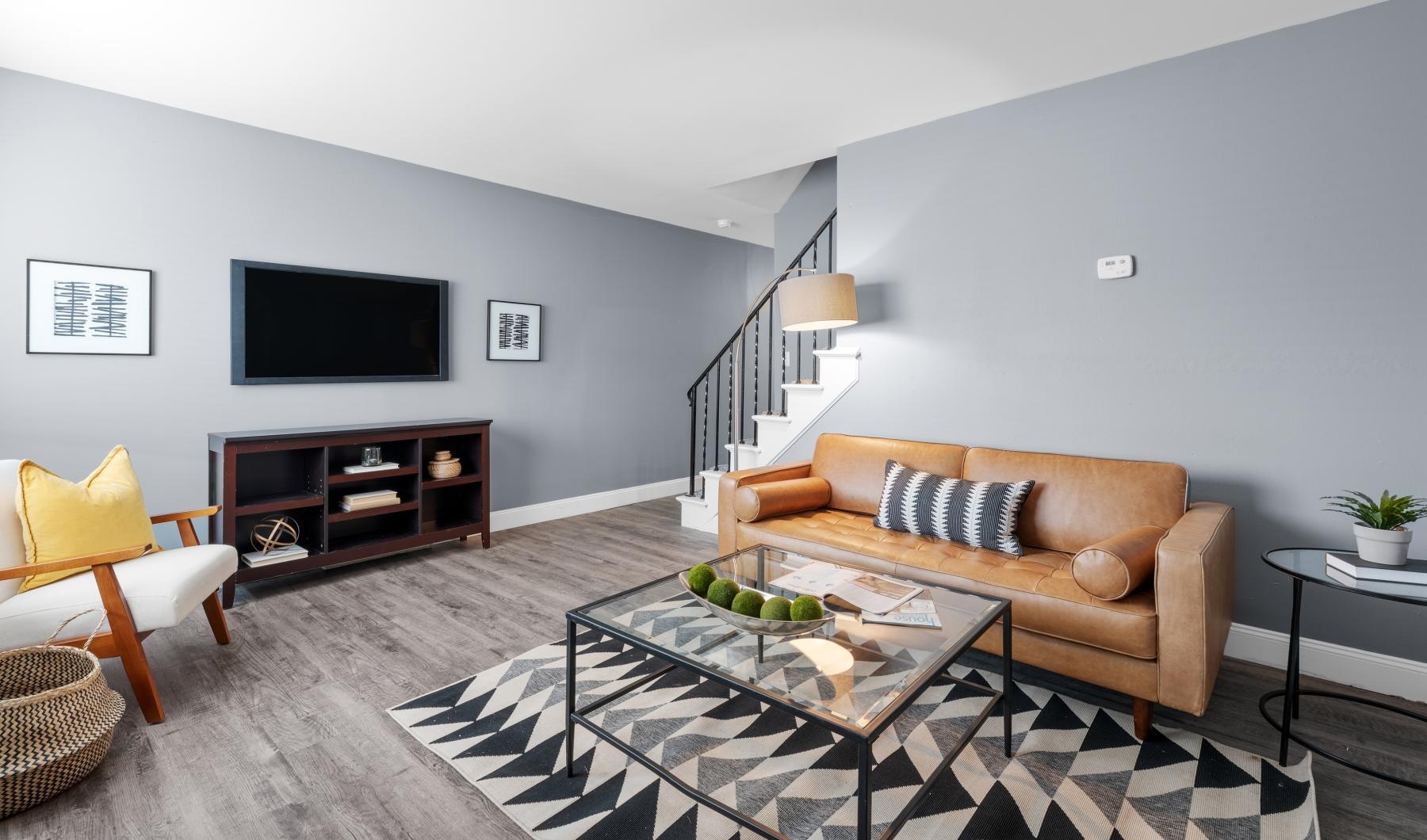 a living room with a couch and a coffee table